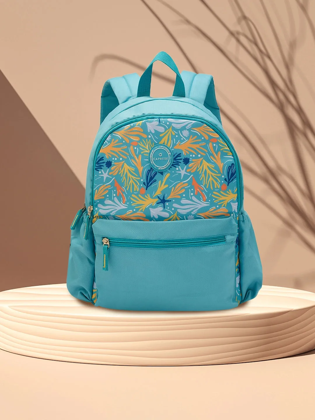 Caprese Xenia Medium Turquoise Printed Backpack